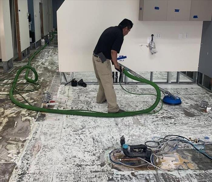Photo of dental office being steam cleaned.