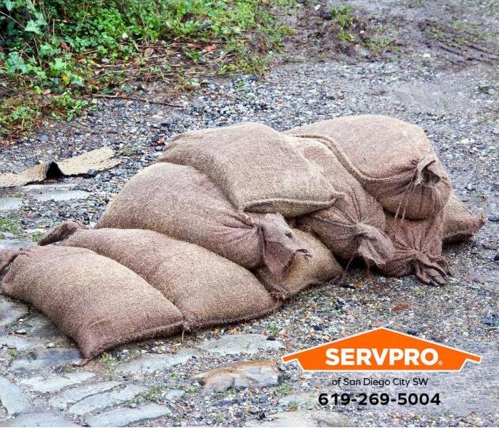 Sandbags are strategically placed to prevent water intrusion in low lying areas.